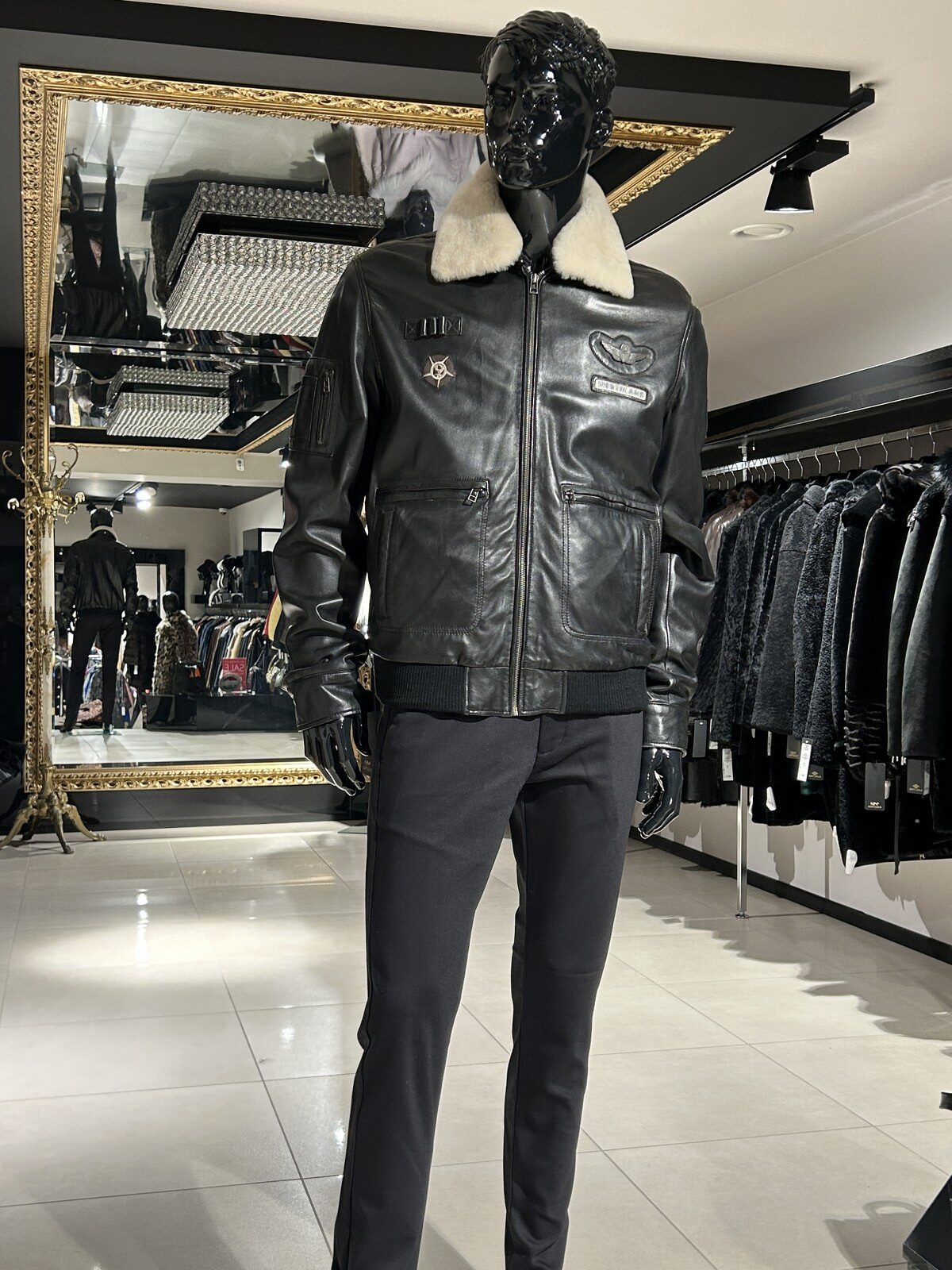 Long-line black jacket with silver fox fur collar